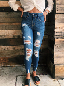 knee ripped jeans